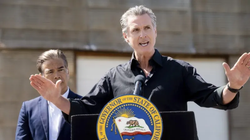 Newsom Threatens to Withhold Federal Taxes, Trump Responds with Budget Cuts